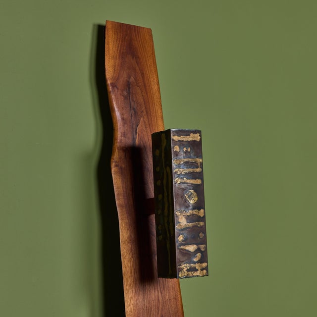 Queen size headboard by American designers Phillip Lloyd Powell and Paul Evans c.1960s, USA. The headboard features two...