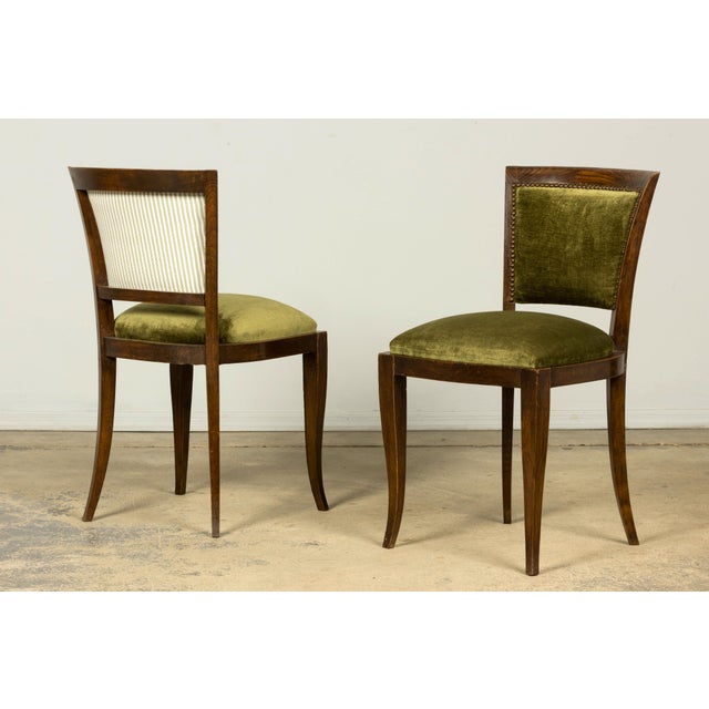 Striking 1930s set of eight French Art Deco dining chairs in maple, sourced in Provence, France. The set comprises six...
