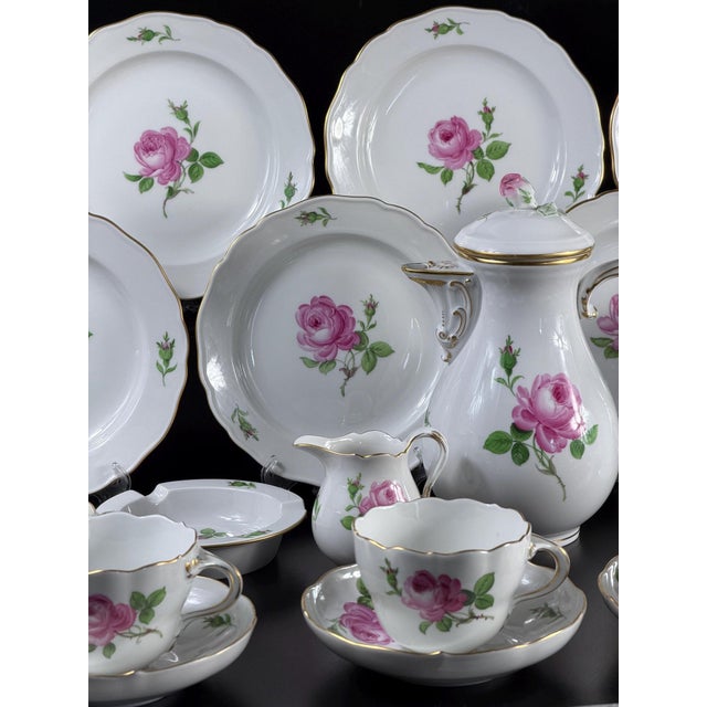 A beautifully preserved vintage porcelain coffee service by the meissen manufactory, decorated in the classic rote rose...