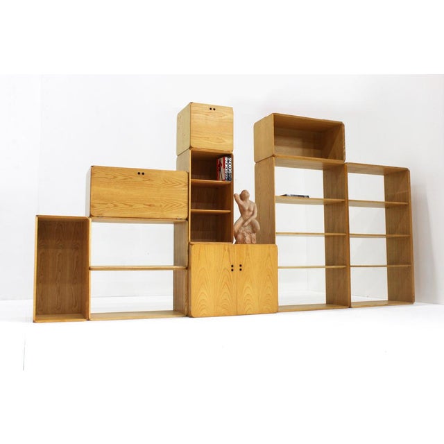 Vintage modular wall unit 'Samara' designed by Derk Jan de vries in the 1980s Italy. This vintage modular wooden storage...