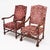 Pair of armchairs from France in the Louis XIII style. The chairs have wood structures; primarily walnut; that have been...
