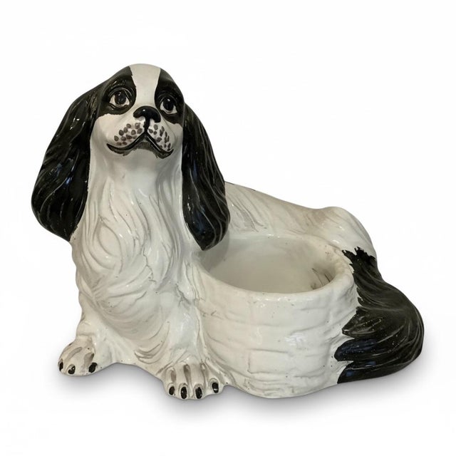 This is a fun Italian Hollywood Regency terracotta spaniel dog planter. It has a black and white glaze. It dates to the...