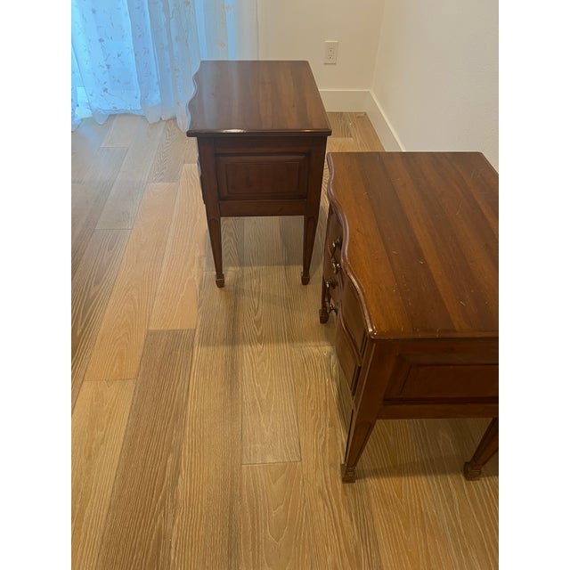 This stunning mid-century, traditional, set of matching nightstands represents American furniture craftsmanship at its...
