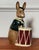 Royal Doulton Bunnybank drummer coin bank, England, 1967. Adorable ceramic brown bunny rabbit dressed in a green coat and...