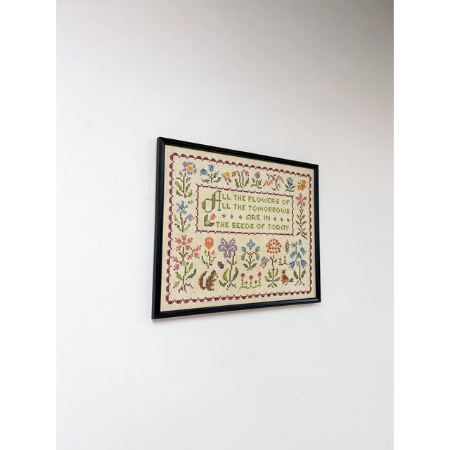 This charming vintage cross stitch sampler is a beautifully detailed and heartwarming handcrafted textile art find. The...