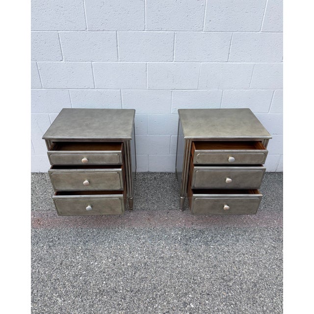 I have a beautiful pair of RH Baby&Child Marcelle Nightstands in an aged silver finish – GOOD condition with some light...
