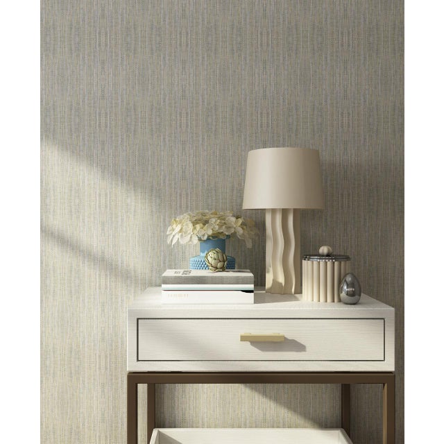 Sustainable, natural paper yarns are dyed prior to weaving into this wicker-inspired pattern with the look of a soft,...