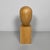Italian postmodern stylized head sculpture in wood, 1990s Sculpture made entirely of wood. The upper part is rounded and...