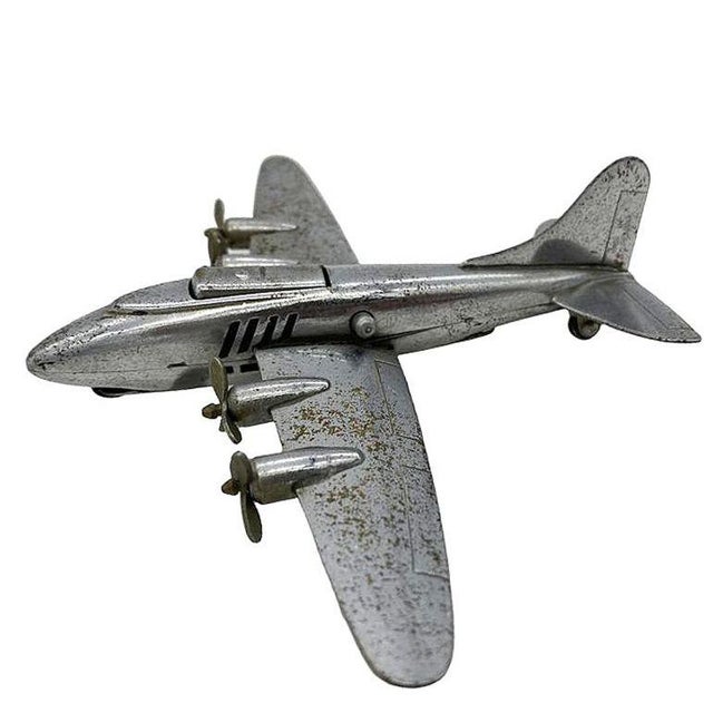 Post-war desktop airplane lighter modeled after the B-29 Superfortress used heavily in WWII. This lighter possesses a...