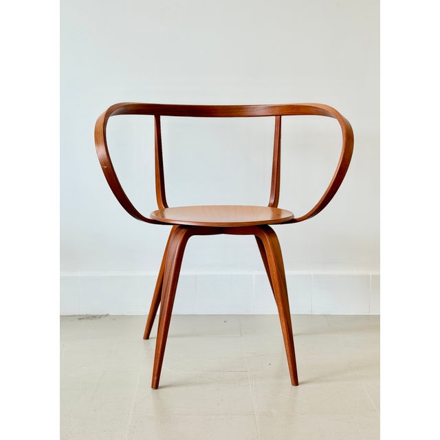 A rare opportunity to acquire a numbered Vitra edition of one of George Nelson’s most distinctive chair designs. An...