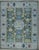 A hand-knotted wool rug in the Kazak tradition, made in India and measuring 10' x 14'. Kazak design is built on bold...