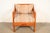 An exceptional Mid-Century Modern lounge chair In the manner of Franklin Shockey USA, Circa 1960s Solid knotty pine frame,...