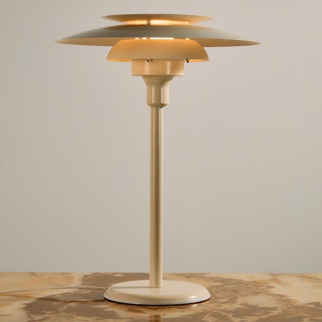 Danish table lamp with three lamellas from the 1890s. The lamp has scratches and wear in places, but in good vintage...