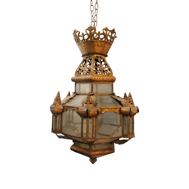 This Spanish antique tole lantern dates to the 1800s and exemplifies decorative metalwork from the period, combining...