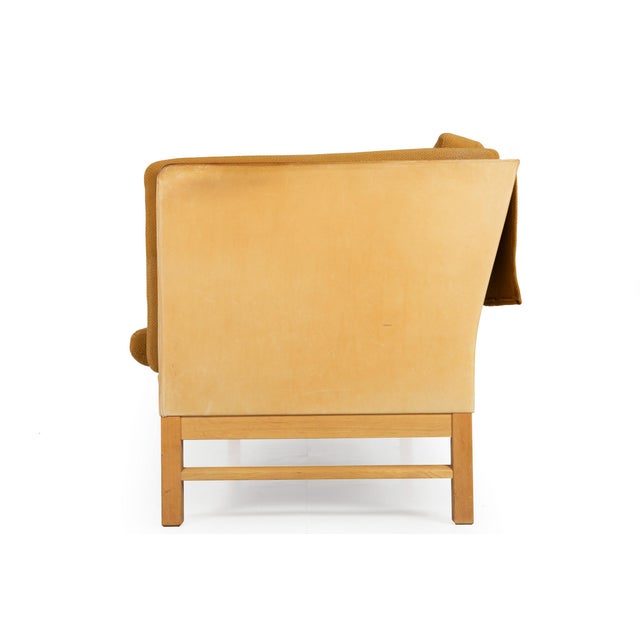 DANISH MODERN MODEL EJ315 TWEED, LEATHER AND OAK TWO-SEATER SOFA Designed by Erik Ole Jørgensen for Erik Jorgensen...