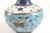 This Antique Chinese Decorative Vase measures 3.5” x 3.5” x 6” and showcases exquisite cloisonné craftsmanship. The vase...