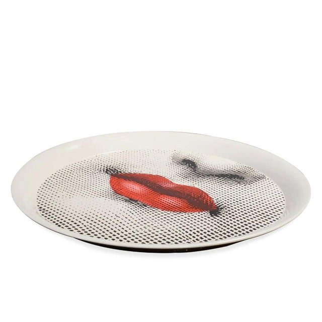 A bold and iconic design, the Fornasetti Bocca Large Metal Tray brings art and function together with unmistakable...