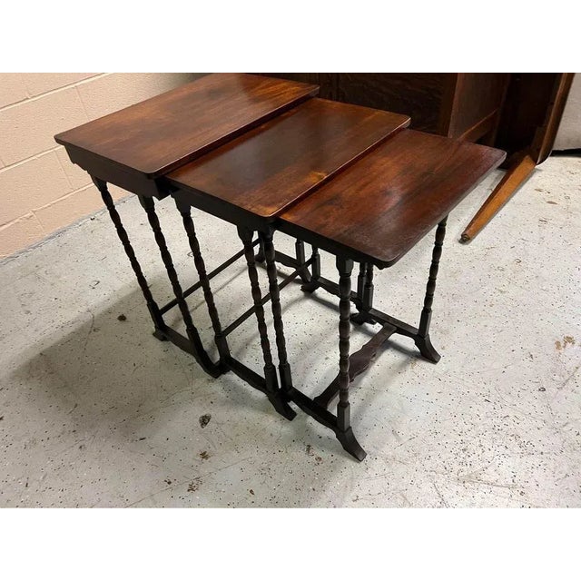 Antique Victorian Mahogany Nest of 3 Tables . Solid wood, rich wood grain Approximate measures: Height 28” width 22.1/2”...