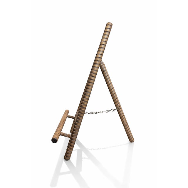 A beautifully crafted vintage tabletop easel featuring richly toned turned wood construction and a classic three-leg form....