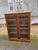 Late 20th Century Traditional-Style Wood 2 Glass Door Bookcase or Display Cabinet Vintage glass front bookcases with three...