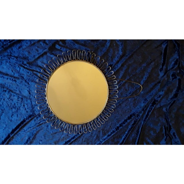 Vintage Round Sun Mirror with Brass Coloured Frame, 1970s, in Very Good conditions. Designed 1970 to 1979