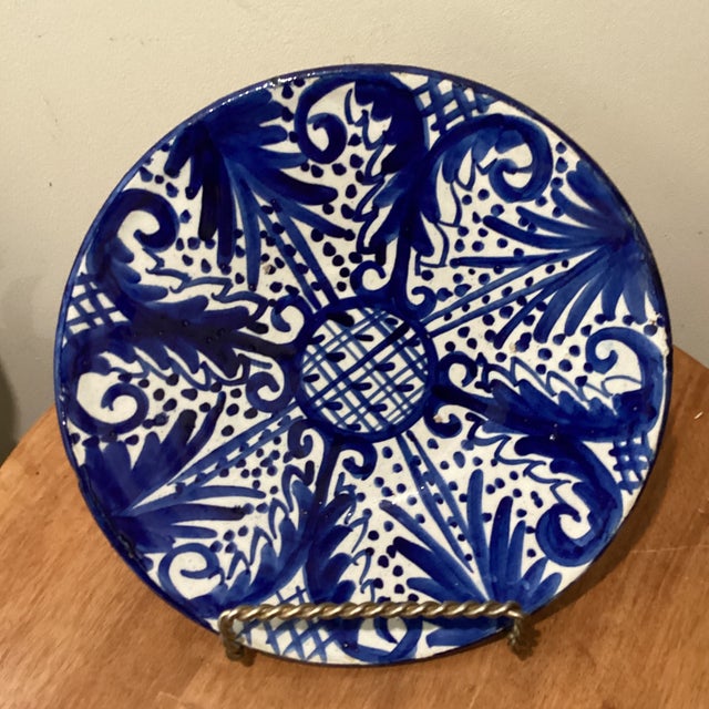 This antique Andalusian ceramic glazed wall plate from Fajalauza (Granada) Spain is a unique and decorative collector's...