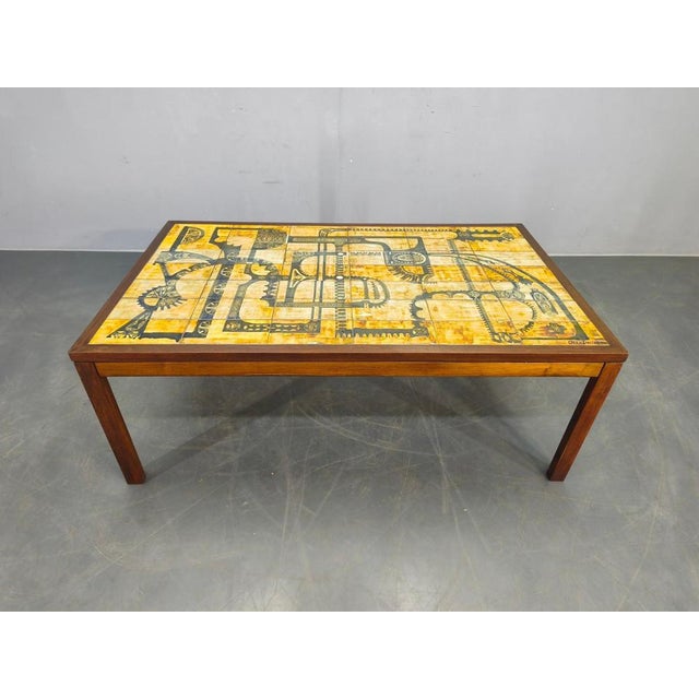 Rare danish mid century coffee table manufactured by haslev møbelfabrik, denmark, 1960s. The table features an impressive...