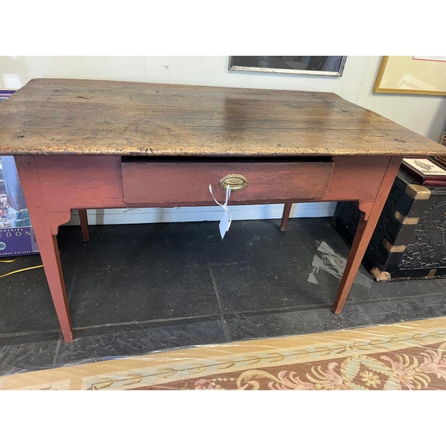 Step back in time with this authentic circa 1797 Pennsylvania farm table, a beautifully preserved piece of early American...