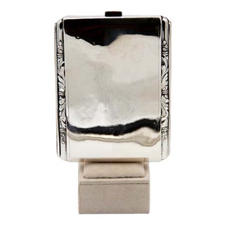 Plain Silver Cigarette Case with Raised Trim and Spring-Loaded Hinged Lid For Sale