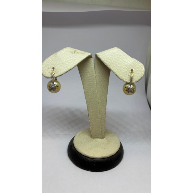 Gemstone details Diamond weight: 0.60 cts Ruby weight: 0.02 cts Lapis weight: 44.44 cts 14K gold Gross weight: 12.36 grams...