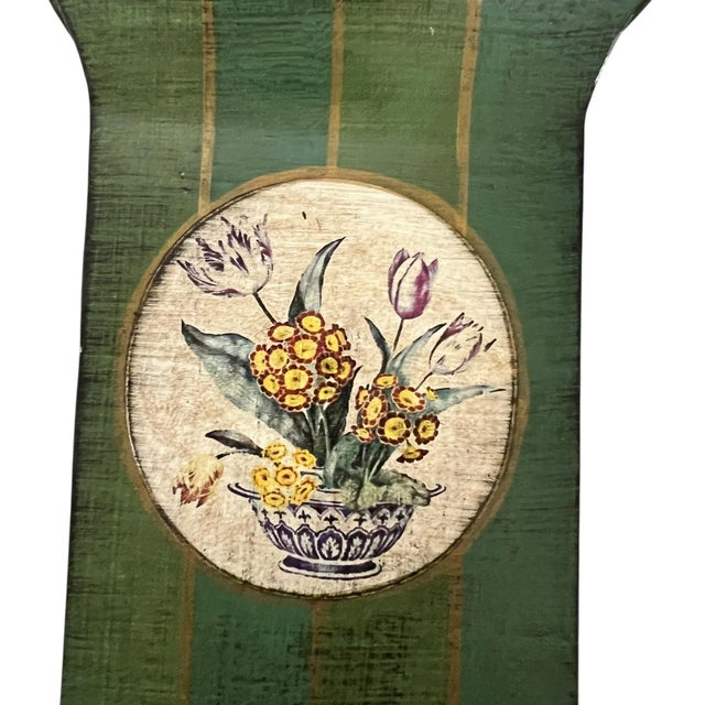 Create a bright spot with this pair of vintage metal tole cache pots. The floral arrangement set in a chinoiserie blue and...