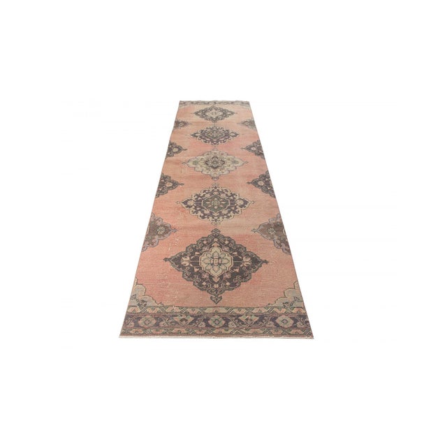 Decorative washed out handknotted vintage rug from Konya region of Turkey. Approximately 50-60 years old. In very good...