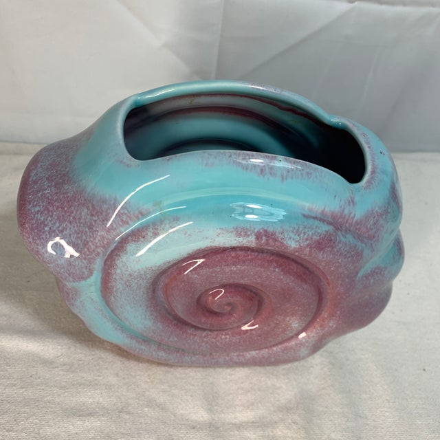 Bring a pop of authentic mid-century charm into your space with this gorgeous 1940s/1950s ceramic shell planter by West...