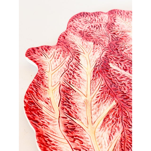 Large Italian majolica trivet in the form of radicchio, a cabbage-like leafy vegetables known for its spicy bitterness....