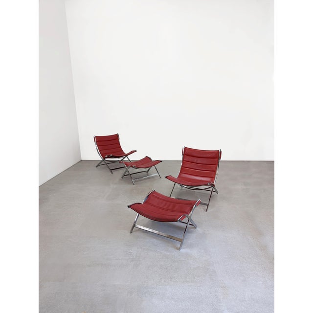 Exclusive set of two armchairs with ottomans of incredible design attributed to Antonio Citterio. These armchairs and...