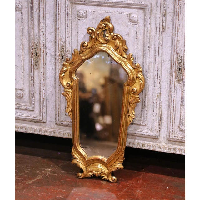Decorate an intimate wall space with this elegant antique Italian Louis XV style mirror, crafted circa 1870. The narrow...