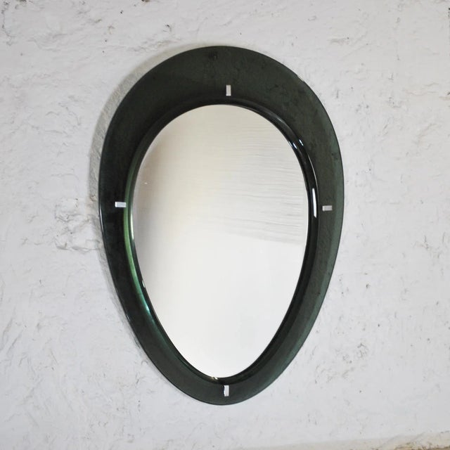 Cristal Art Mirror with Side Frame in Glass, 1950s, in Good conditions. Designed 1950 to 1959 This piece is attributed to...