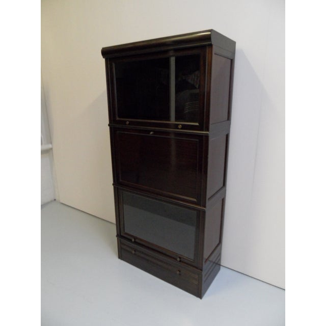 Vintage Mahogany Stackable Bookcase with Bar, 1960s, in Very Good conditions. Designed 1960 to 1969