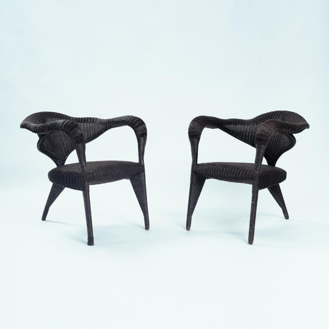 Sculptural set of 2 tripod rattan chairs. They remind you of Boris Sipek, the Dutch Tchech designer, but I do not think...