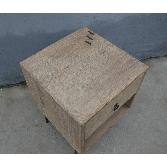Simple and full of character, this Chinese reclaimed pine nightstand showcases the natural beauty of aged wood. With its...
