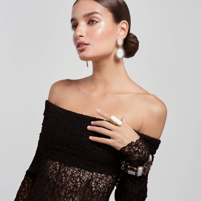 Crafted from semi-precious stones, the Gemma Earrings feature a striking new design with a unique oval shape and...