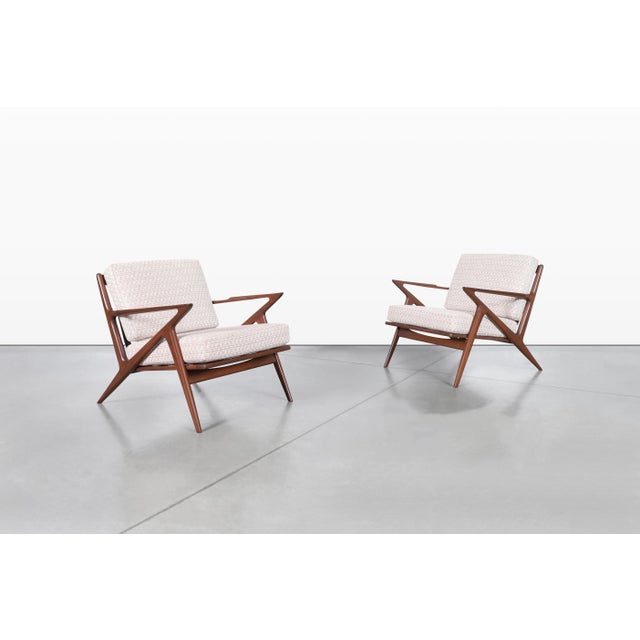 A stunning pair of Poul Jensen "Z" lounge chairs for Selig, straight from the heart of Denmark's 1960s design revolution....