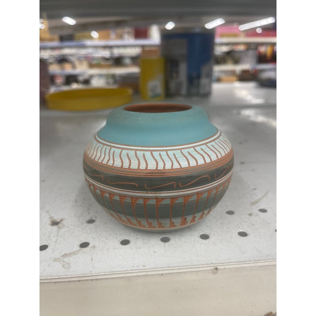 Here is a beautiful hand thrown, etched and colored Native American Navajo Pottery Pot By Dena J. Condition is great with...