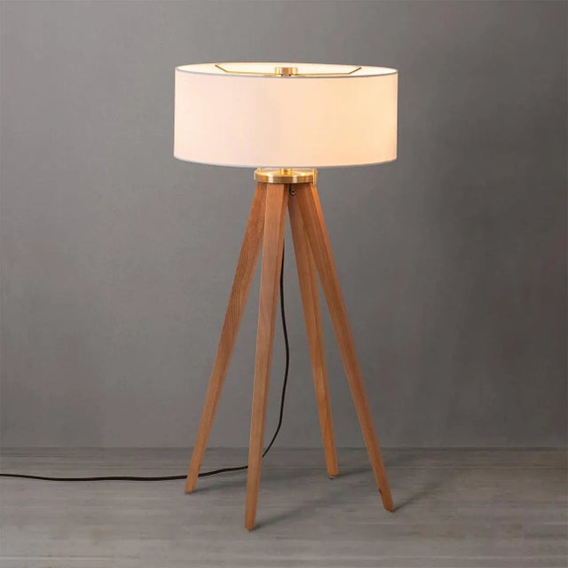 The Quattro Table Lamp by NOVA of California, a stunning synthesis of modern design and timeless elegance. Adorned with...