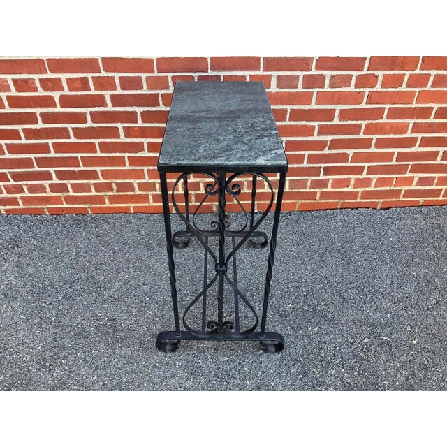 Vintage Wrought Iron Marble Top Table in very good estate condition. Please review the pictures because they are an...