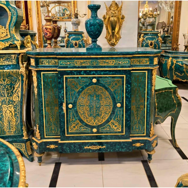 Make a grand statement with this Monumental Louis XVI Style Commode Cabinet, finished in a rich emerald bottle green tone...