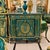 Make a grand statement with this Monumental Louis XVI Style Commode Cabinet, finished in a rich emerald bottle green tone...