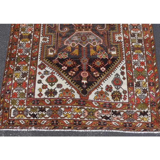 Antique Persian Bakhtiar Gallery Rug Featuring a Multi-Medallion Tribal Design For Sale - Image 15 of 16