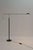 Nestore floor lamp designed by Carlo Forcolini and produced by Artemide. This swing-arm model is made entirely of metal...