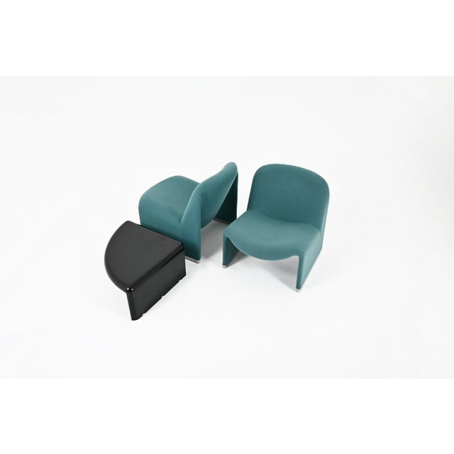 Pair of blue fabric armchairs and table by giancarlo piretti, alky model. Armchairs numbered under the legs. Seat height:...